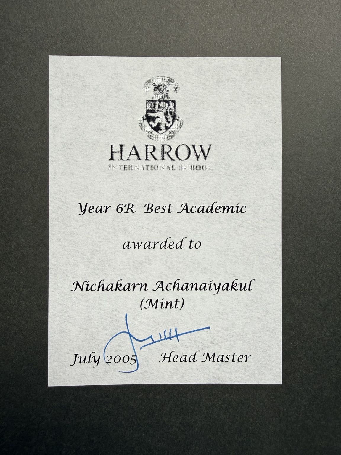 Harrow International School certificate — Year 6R Best Academic, awarded to Nichakarn Achanaiyakul (Mint), signed by the Head Master, July 2005
